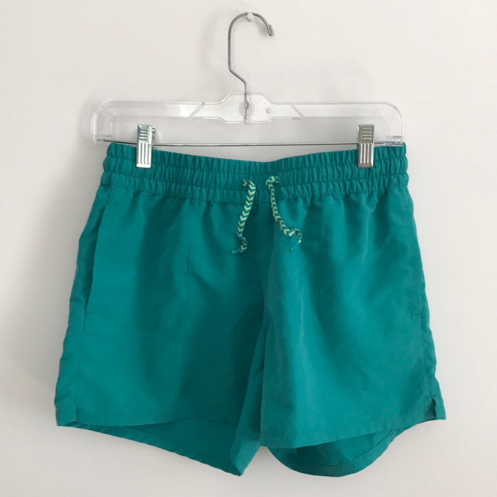 Green women’s north face adventure shorts small